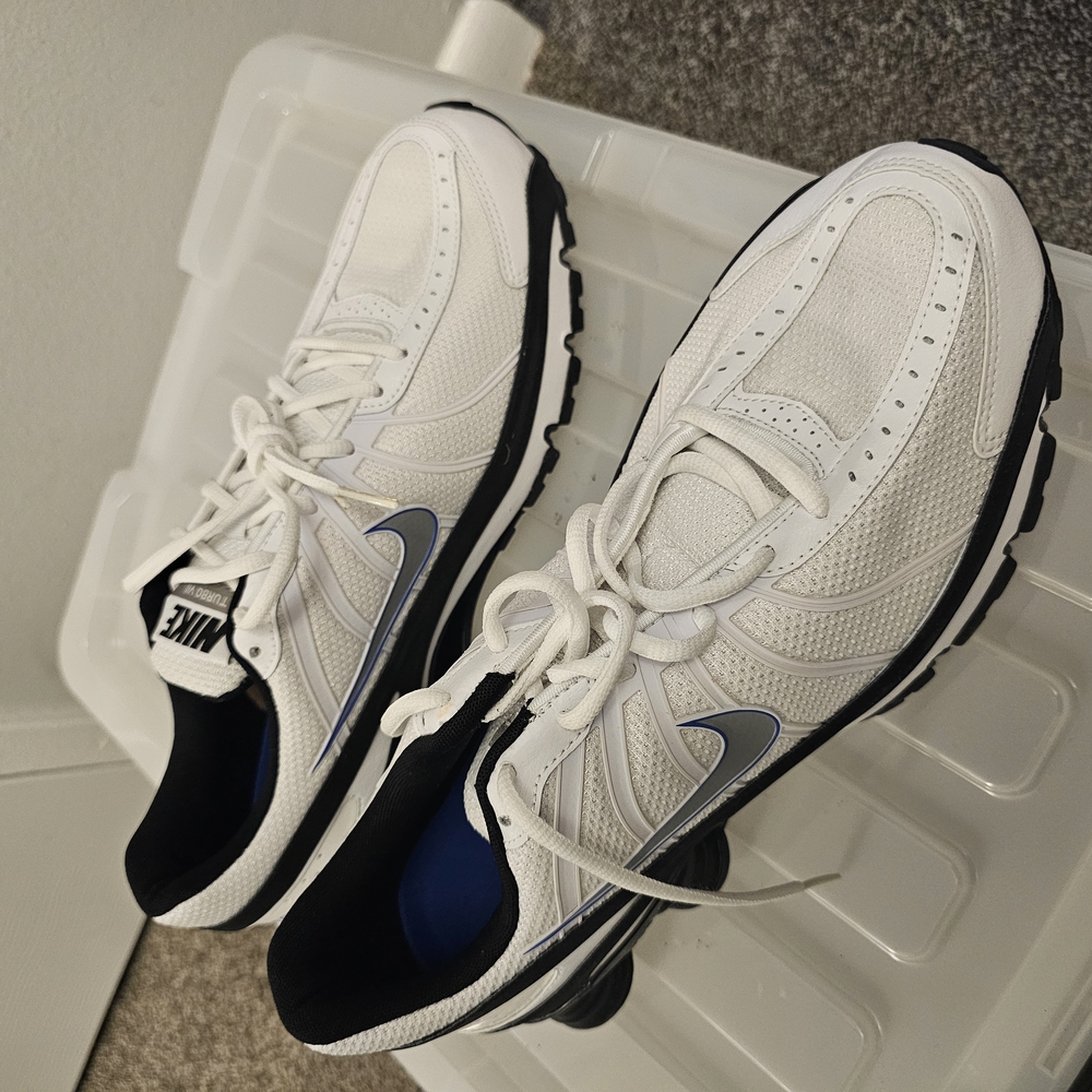 Nike White and Black Athletic Shoes with Modern Design